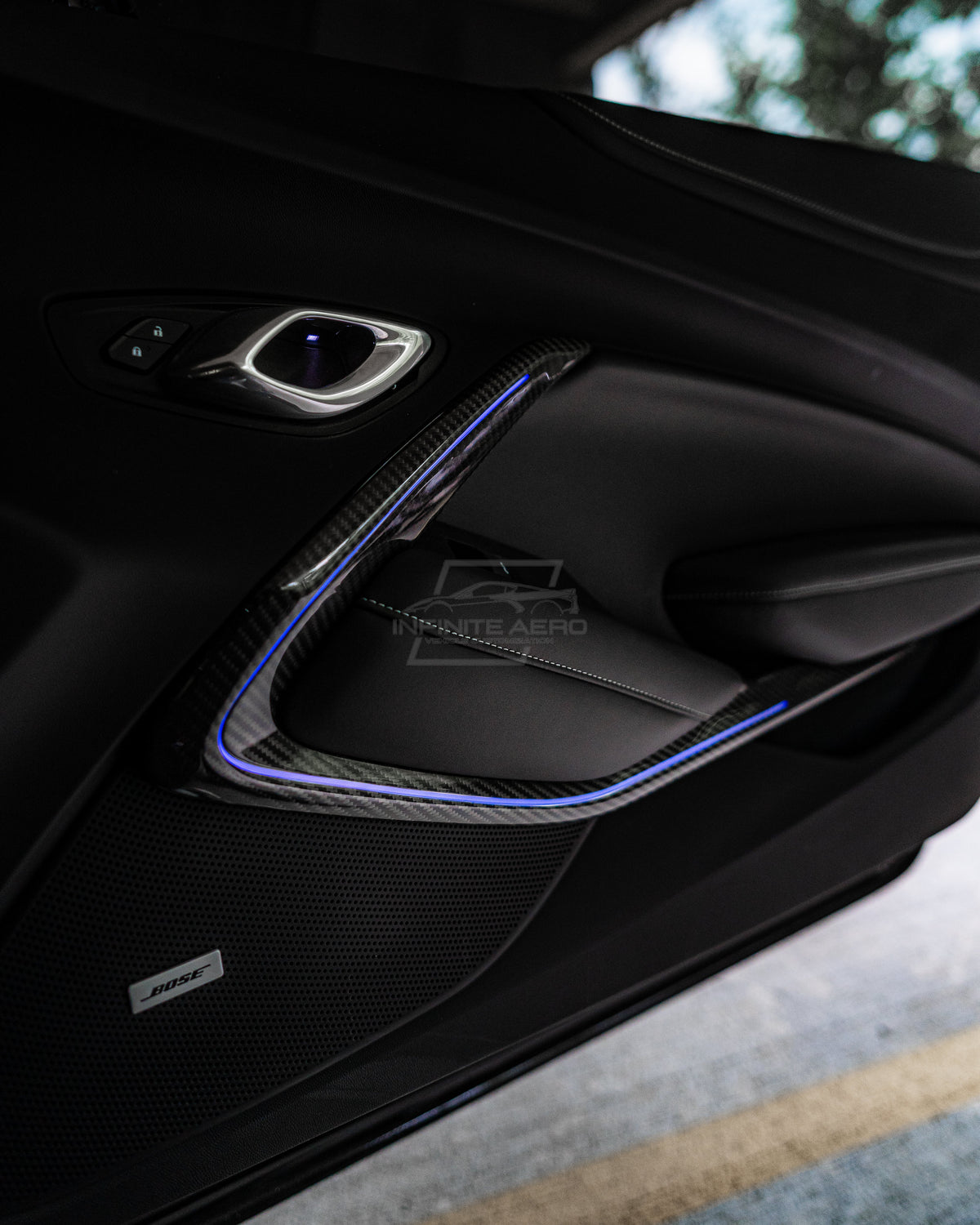 CAMARO 16-24 CARBON FIBER INTERIOR DOOR PANEL CHROME DELETE