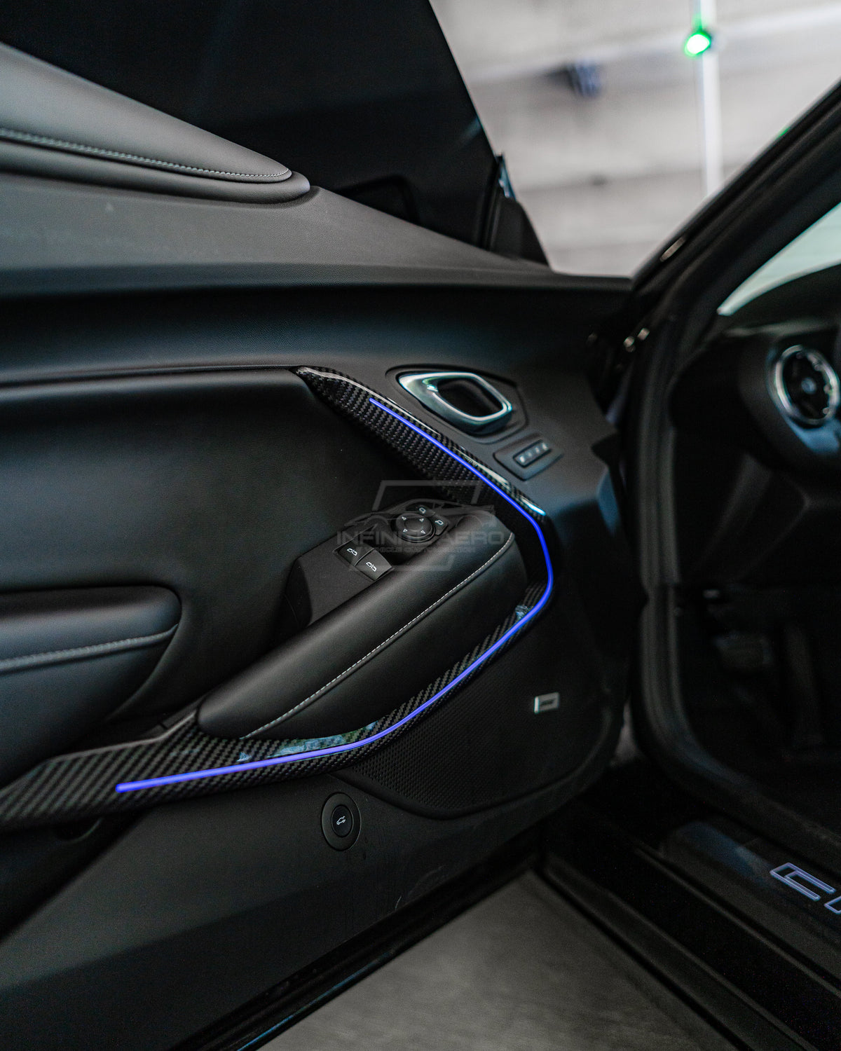 CAMARO 16-24 CARBON FIBER INTERIOR DOOR PANEL CHROME DELETE